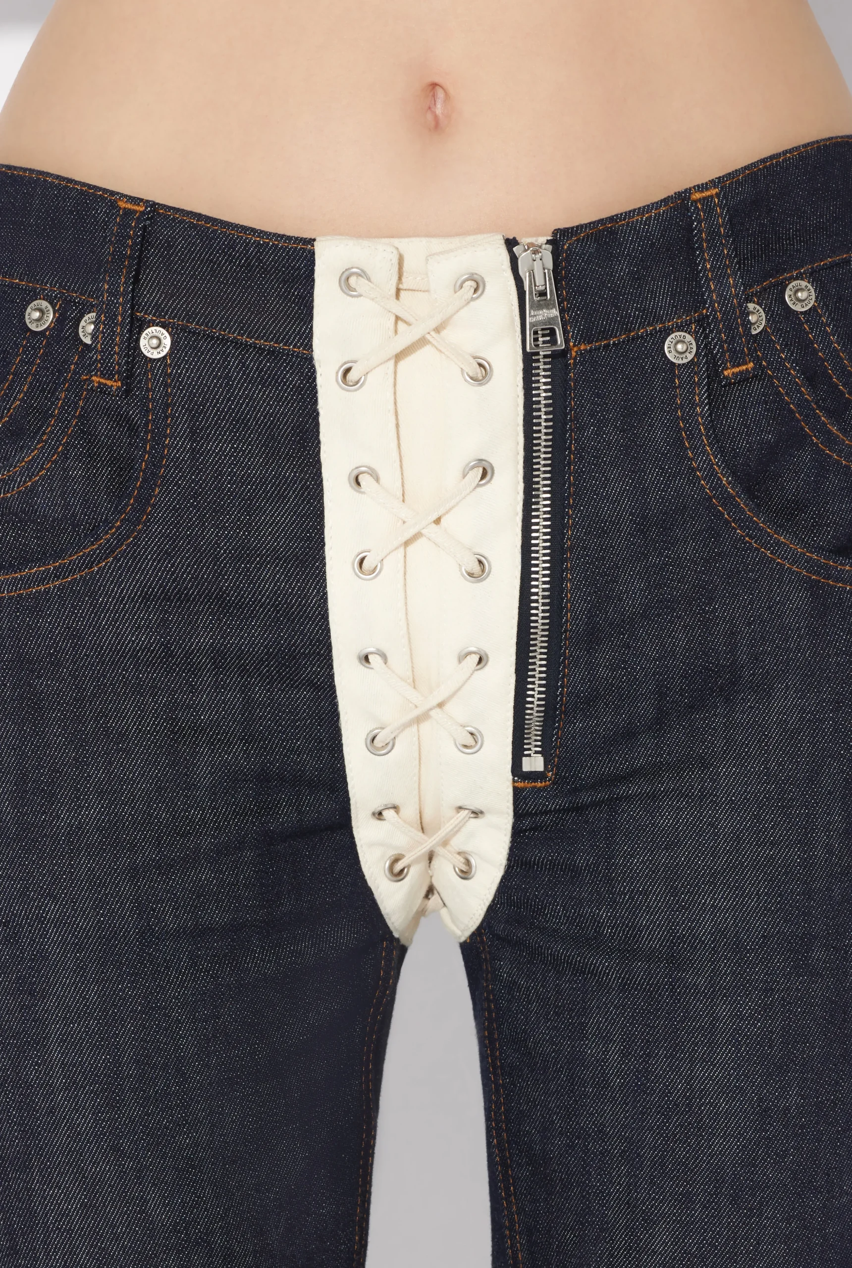 The Contrasting Lace-Up Denim Jeans