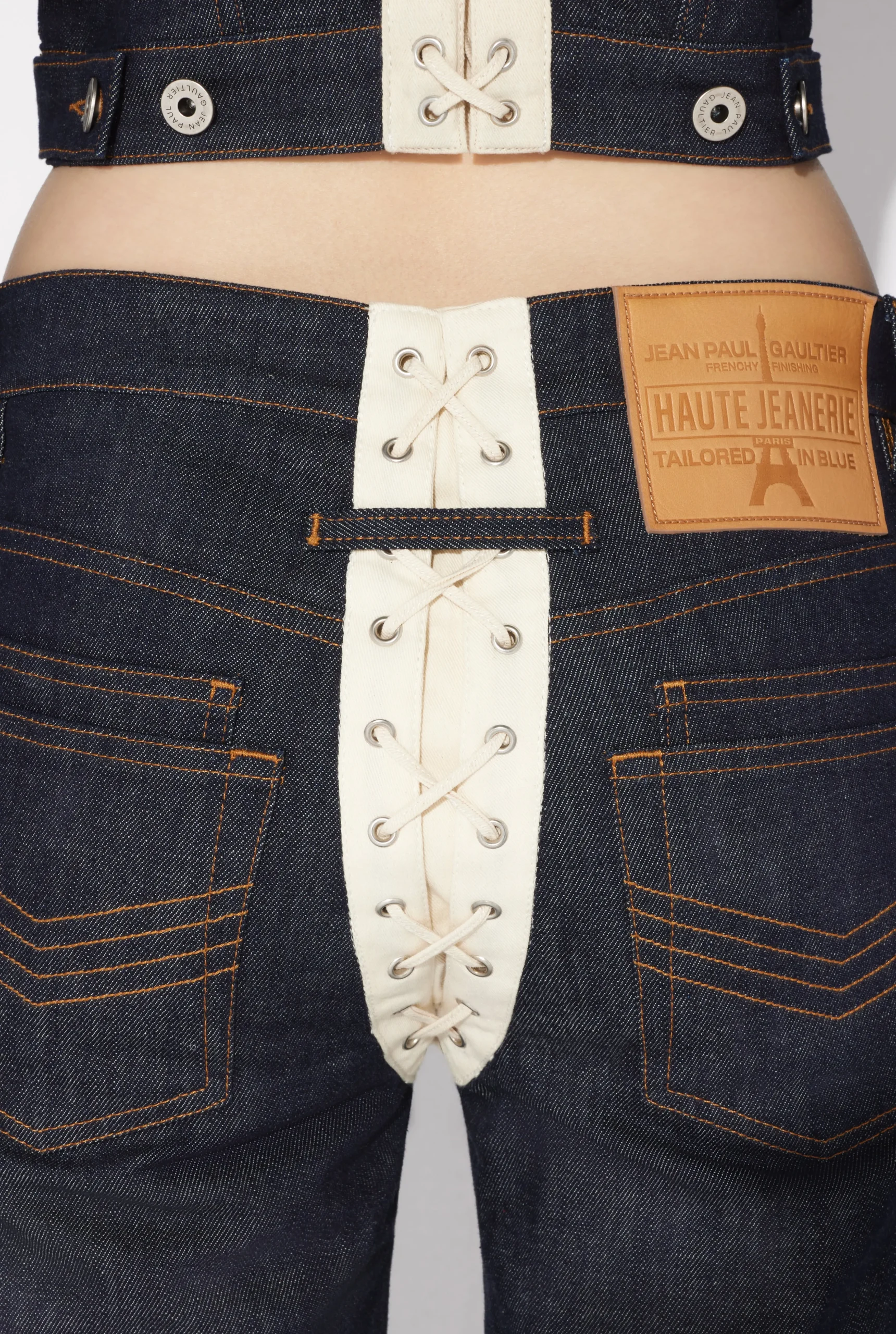 The Contrasting Lace-Up Denim Jeans